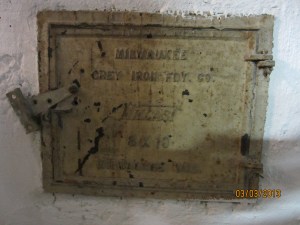 the old fireplace ash trap door