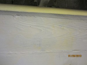 Wood impression on foundation walls.