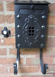 fresh mailbox, updated doorbell, but true to the original style